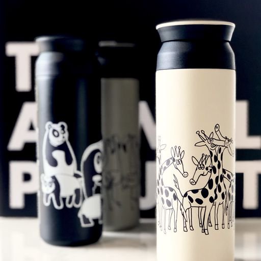 Travel tumblers featuring animal drawings